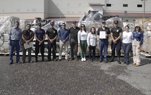 Members from Instituto Nacional Penitenciario, USAID, and nonprofit organizations pose in front of humanitarian aid being picked up from Soto Cano Air base, Honduras, Nov. 18, 2024. Over the last year, Soto Cano Air Base has received 41 shipments through the Denton Program valuing more than 1.8 million dollars. (U.S. Army courtesy photo)