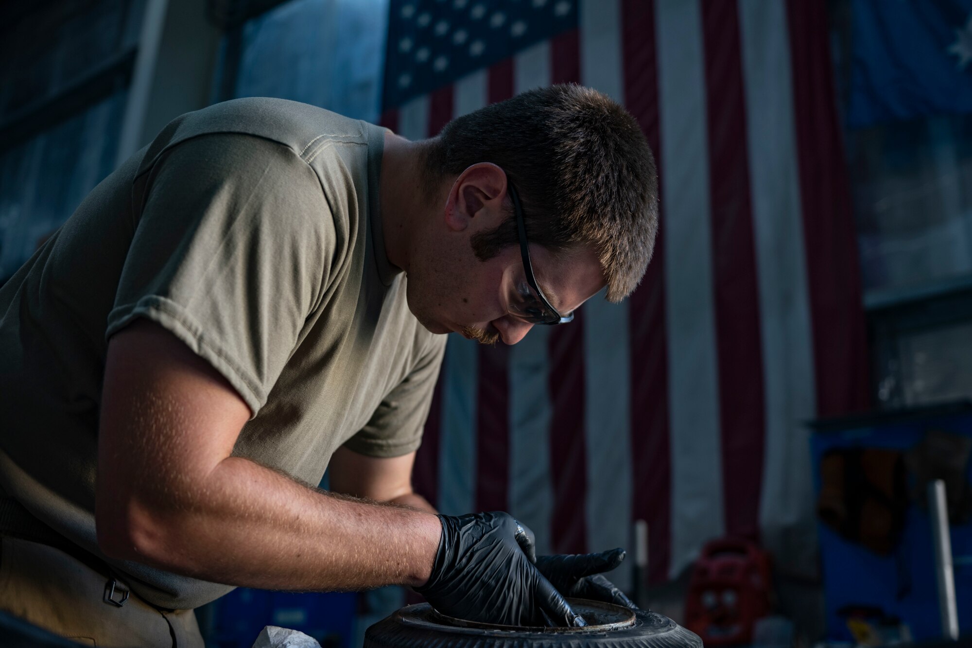Airmen work on equipment.