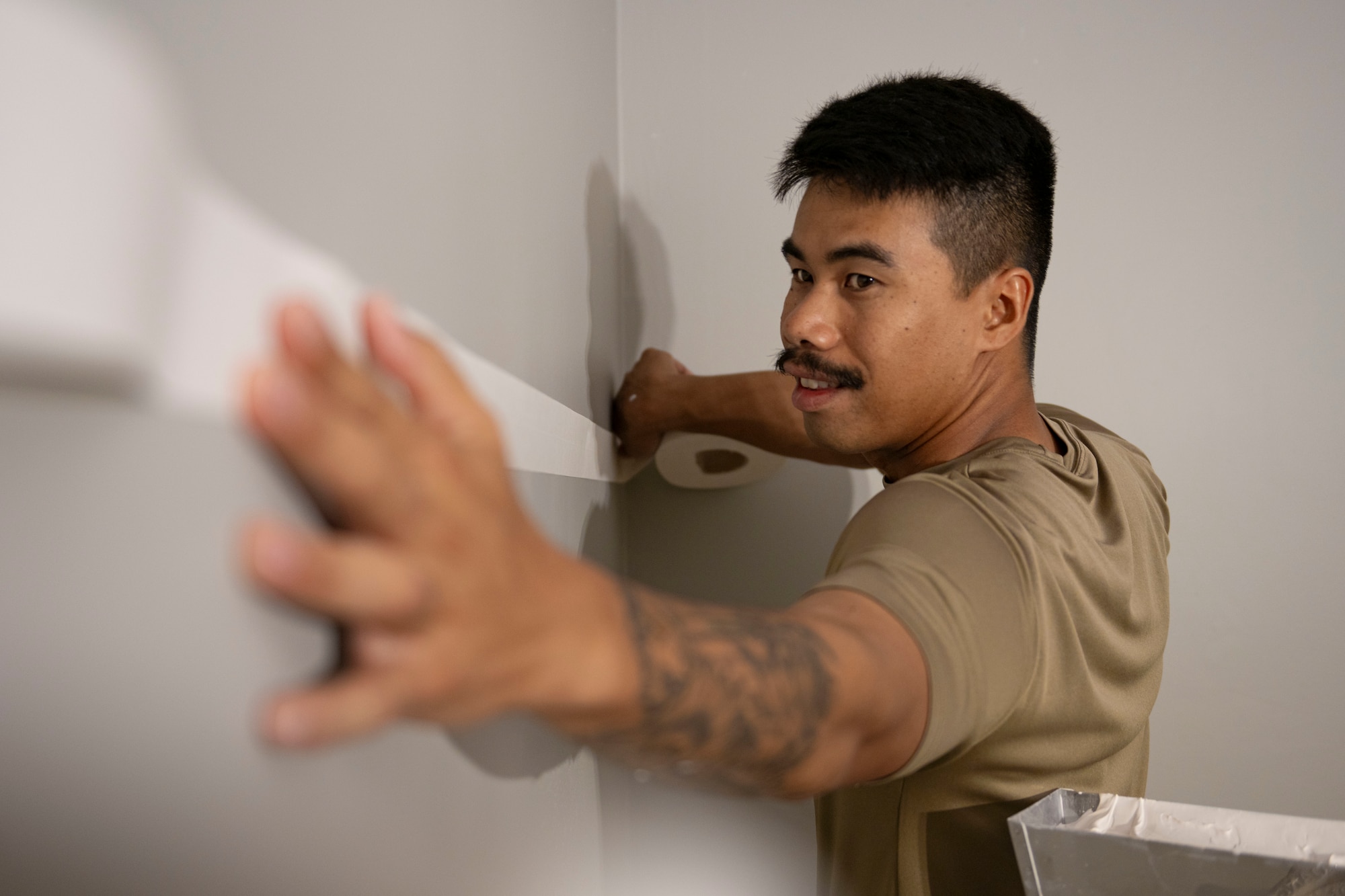 Airmen fix dorm.