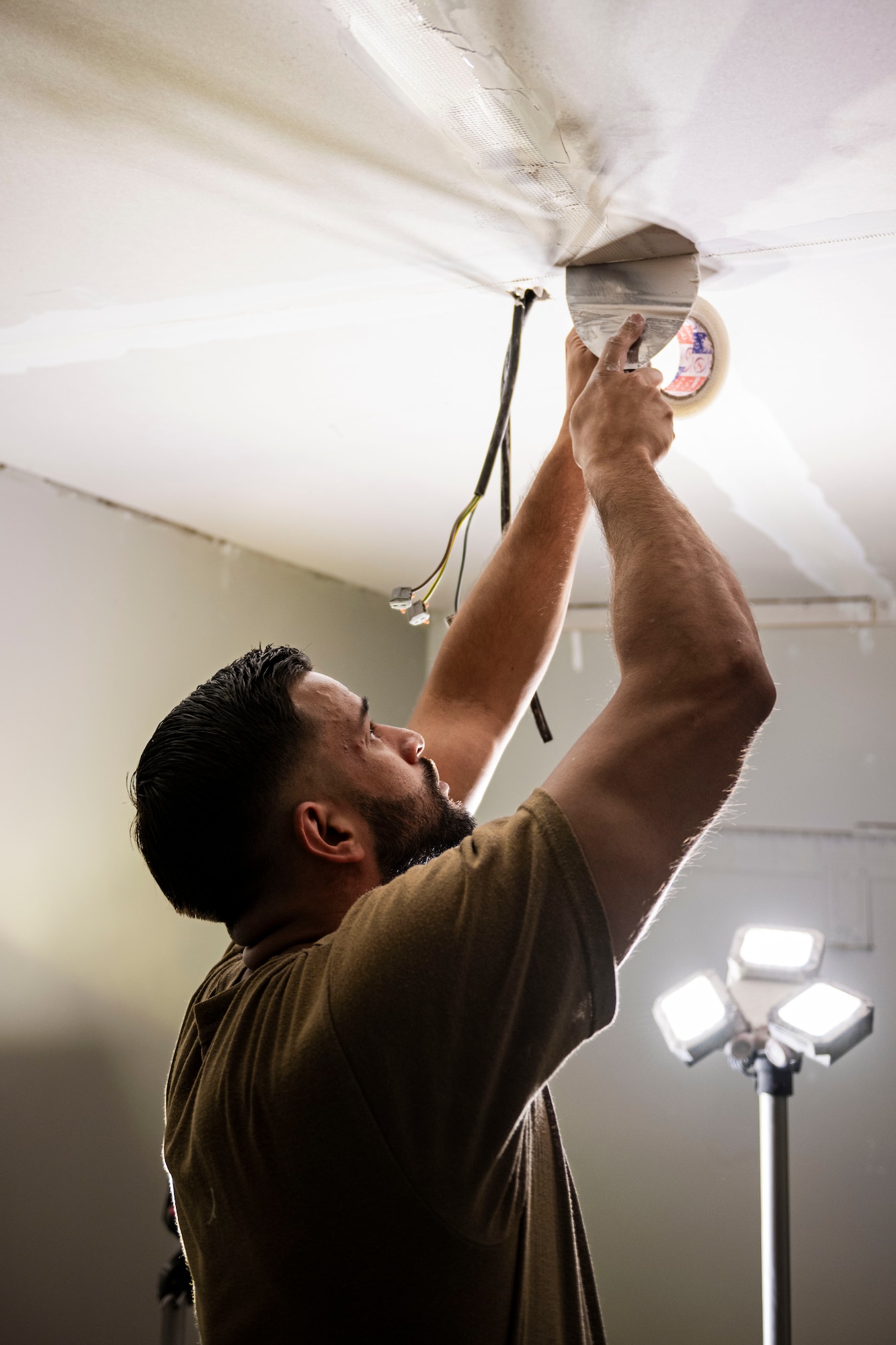 Airmen fix dorm.