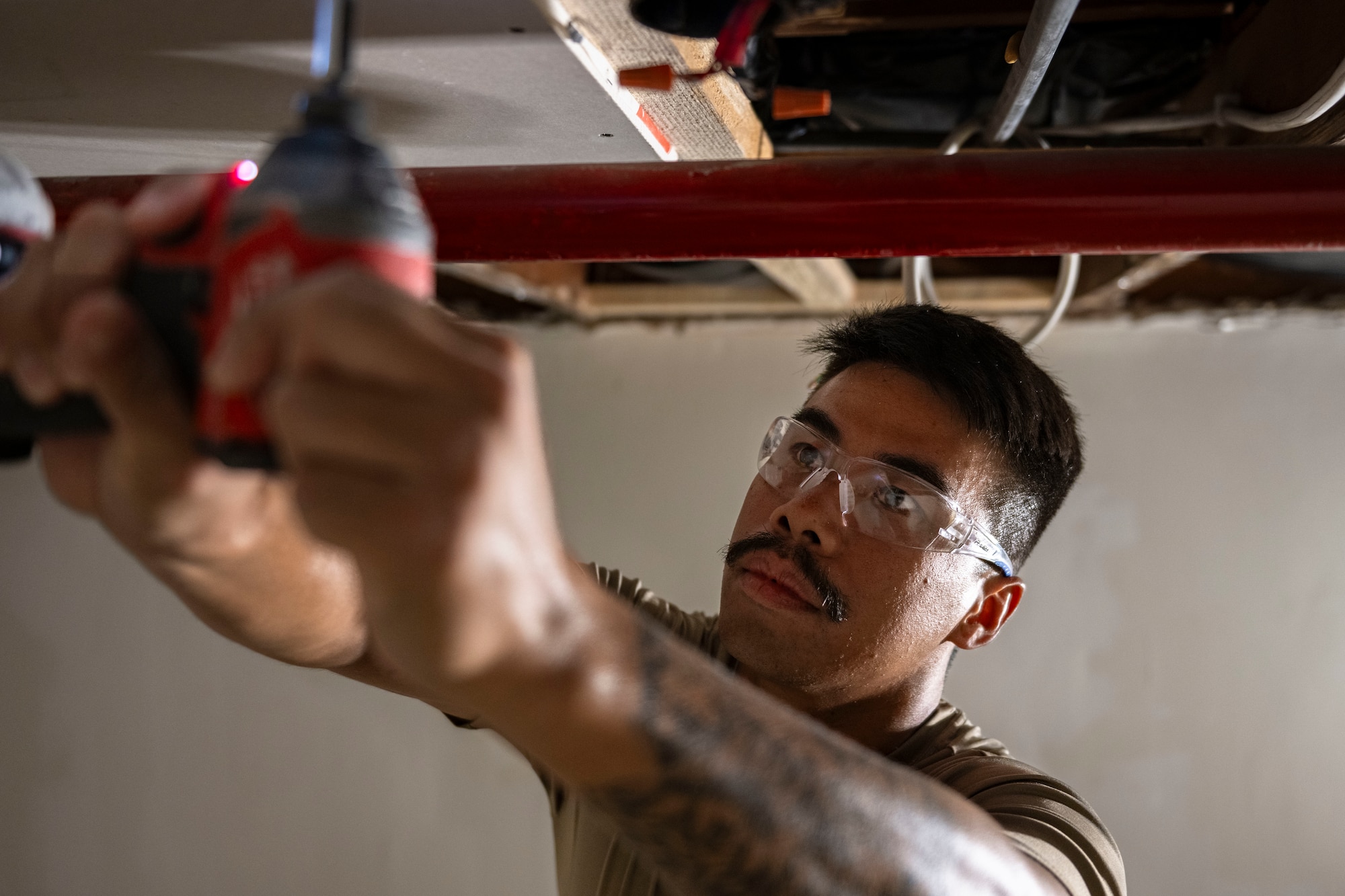 Airmen fix dorm.