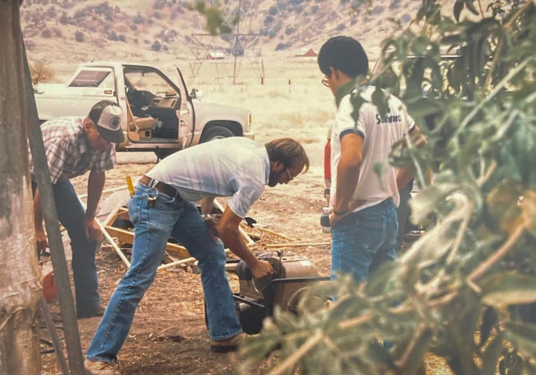 Calvin Foster helps cut apart a tree at a U.S. Army Corps of Engineers Sacramento District water resource project.