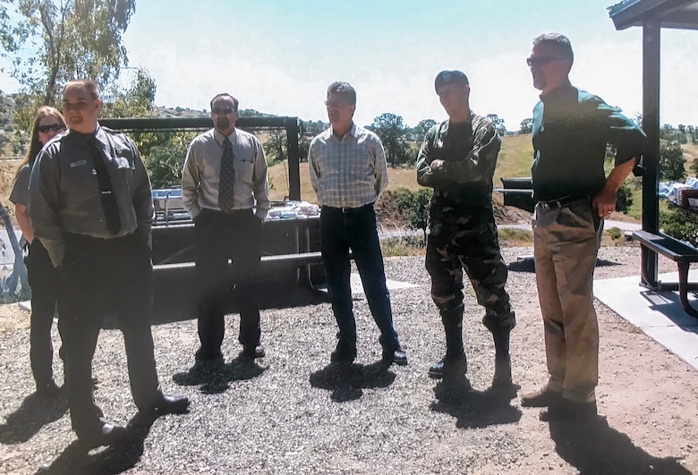 Calvin Foster meets with colleagues at a U.S. Army Corps of Engineers Sacramento District water resource project.