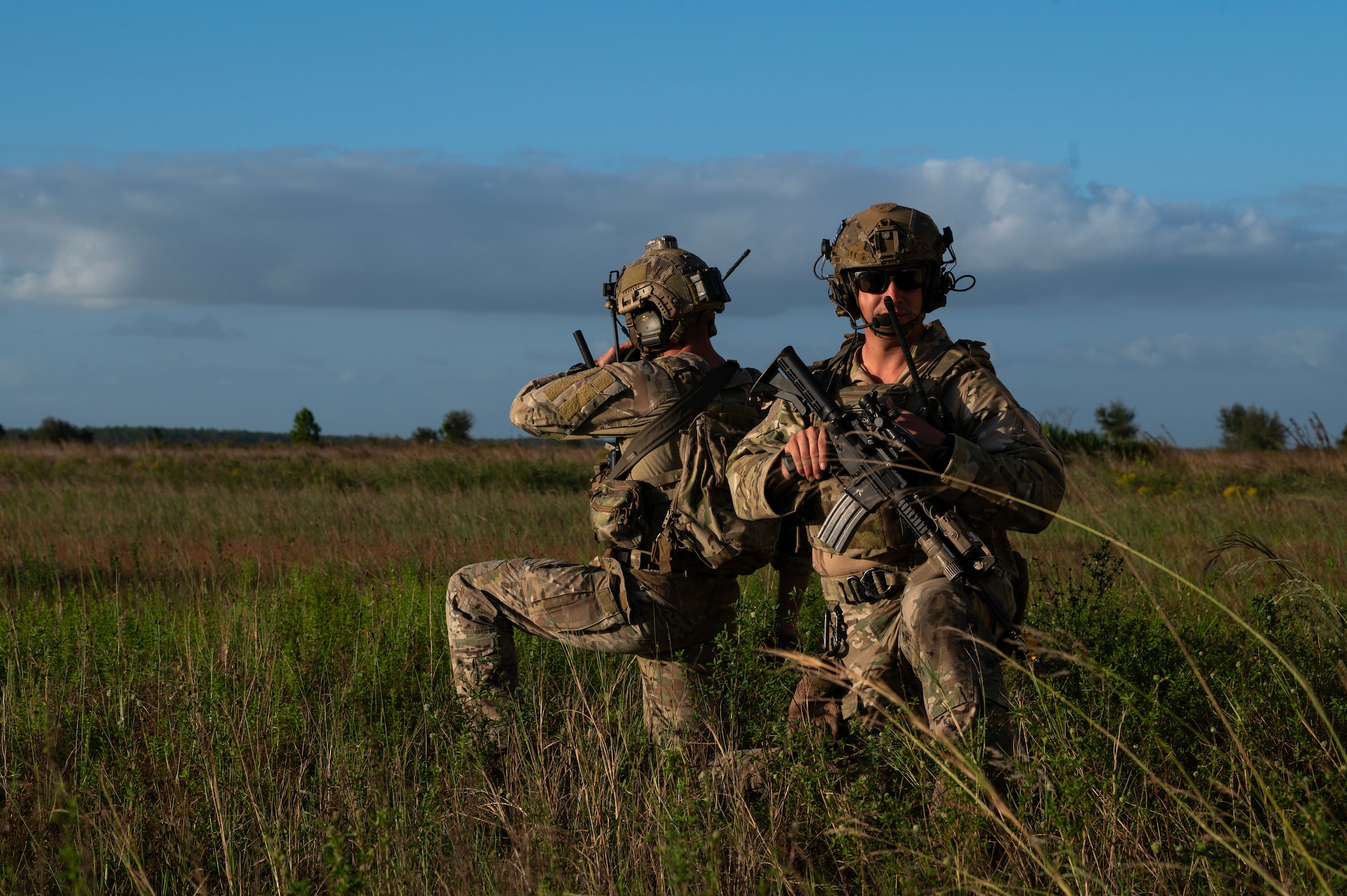 Airmen kneel