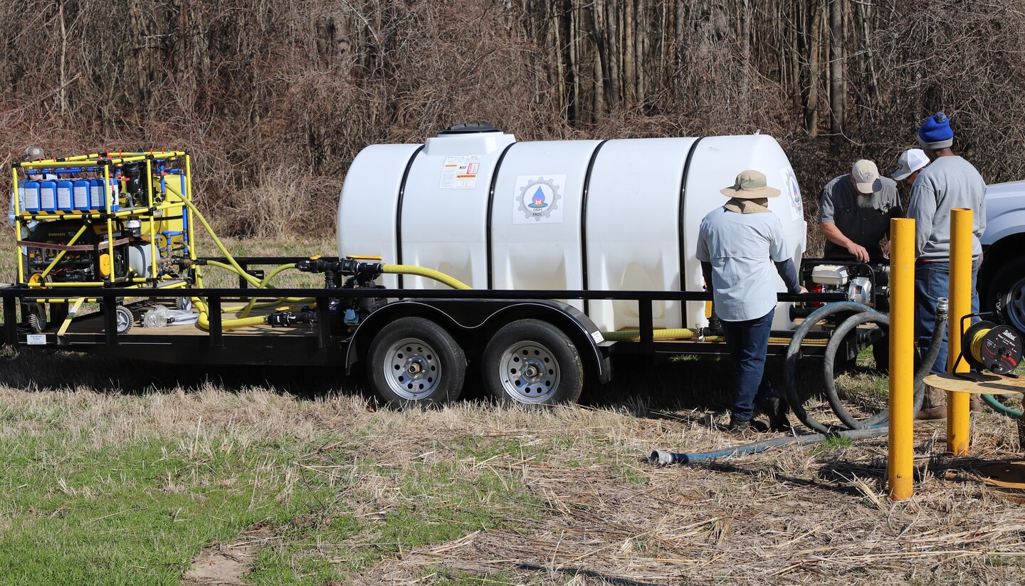 A multi-agency team of researchers and specialists from the U.S. Army Engineer Research and Development Center, the U.S. Army Corps of Engineers Vicksburg District, the U.S. Environmental Protection Agency and industry collaborator WaterStep prepare the Relief Well Sustainment Deployable Resilient Installation water Purification and treatment System at a test site in Magna Vista, Miss., February 20, 2024.