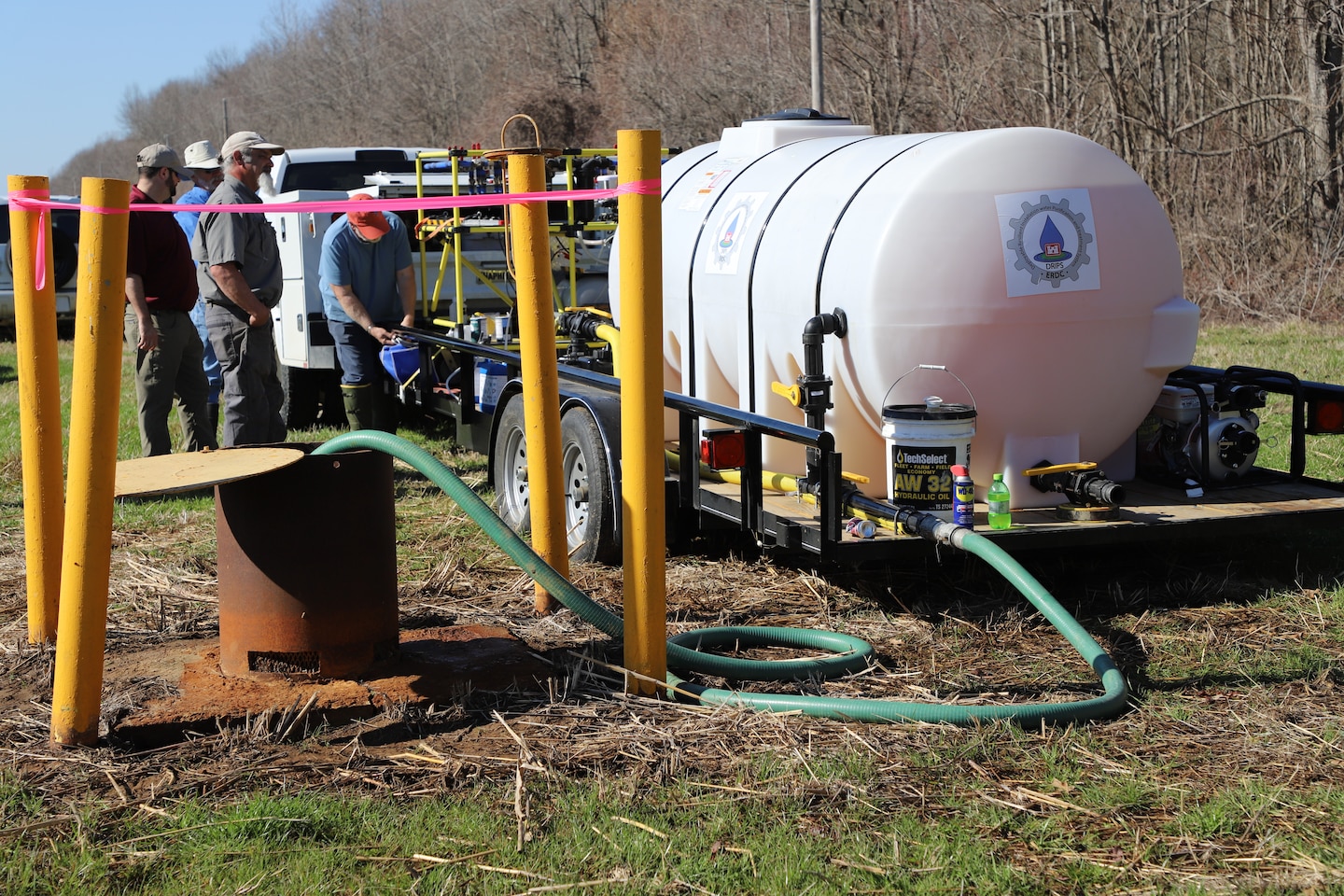 The Relief Well Sustainment Deployable Resilient Installation water Purification and treatment System pumps sodium hypochlorite into a relief well located on the Mississippi River in Magna Vista, Miss., February 20, 2024.