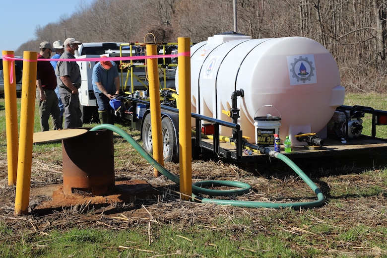 The Relief Well Sustainment Deployable Resilient Installation water Purification and treatment System pumps sodium hypochlorite into a relief well located on the Mississippi River in Magna Vista, Miss., February 20, 2024.
