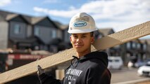 U.S. Marine Corps Pfc. Lucas Ng, a basic intelligence marine from Recruiting Sub-Station Fort Collins, poses for a photo in Greeley, Colo., Nov. 15, 2024. Marines with RSS Fort Collins volunteered with Habitat for Humanity to help build homes, showcasing their dedication to giving back and supporting the local community. (U.S. Marine Corps photo by Sgt. Jackson Ricker)