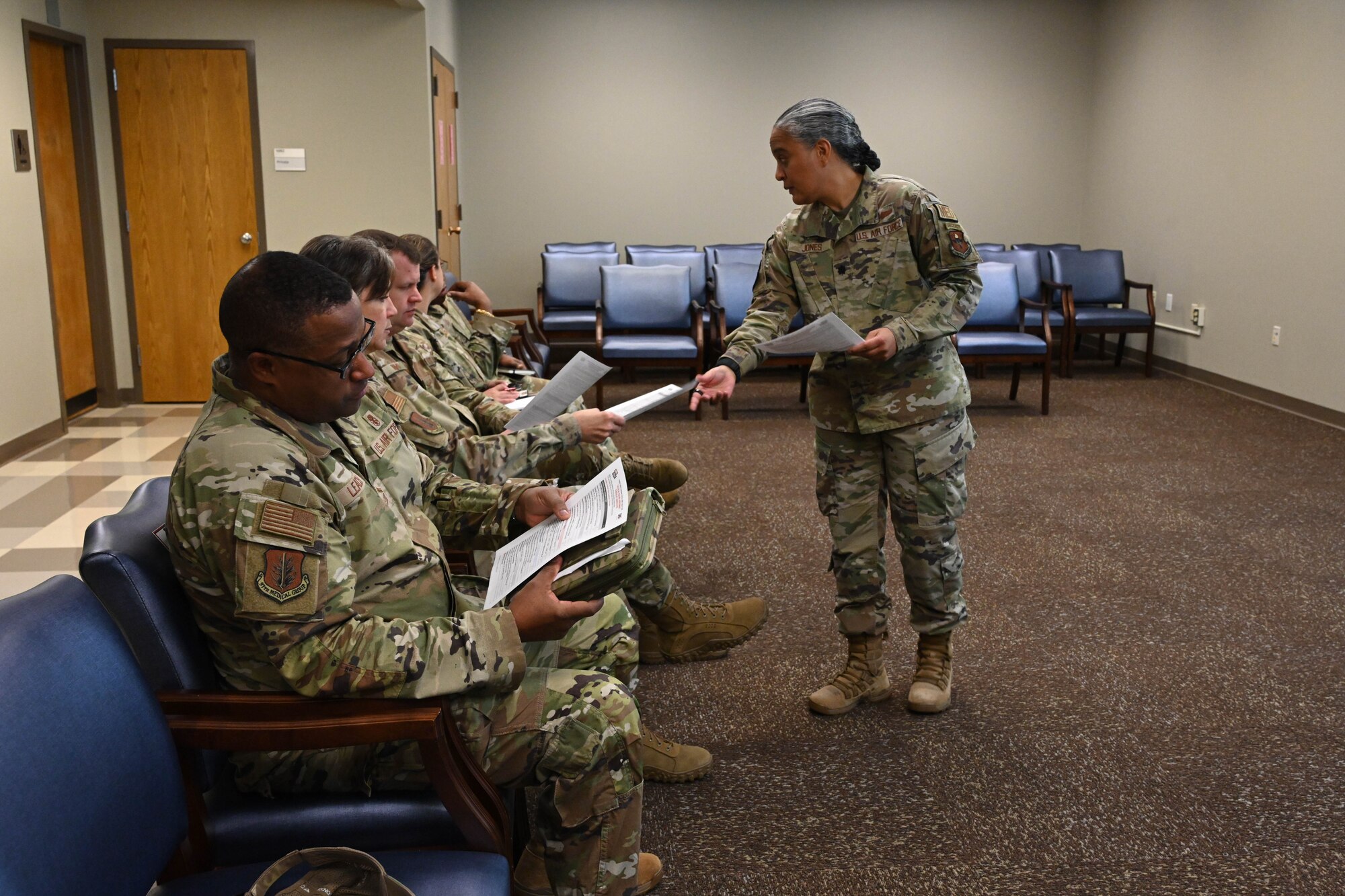 U.S. Air Force Lt. Col. Shanti Jones, 97th Operational Medical Readiness Squadron commander, briefs medical leadership from Air Education and Training Command on Caduceus Spear at Altus Air Force Base, Oklahoma, Nov. 20, 2024. Caduceus Spear is an exercise that allows Airmen to gain experience in tactical combat casualty care. (U.S. Air Force photo by Senior Airman Miyah Gray)