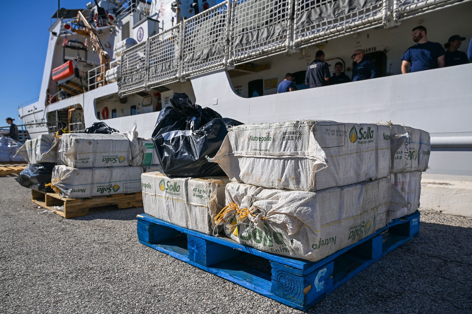 More than 1,510 pounds of cocaine and 1,470 pounds of marijuana with a combined value of approximately $18.5 million are offloaded by crewmembers of Coast Guard Cutter Vigilant in Port Everglades, Florida, November 22, 2024. During the Vigilant’s 54-day patrol, Coast Guard crews, working alongside interagency and international partners, seized the illegal drugs in the international waters of the Caribbean Sea during two separate interdictions. (U.S. Coast Guard photo by Petty Officer 3rd Class Eric Rodriguez.)