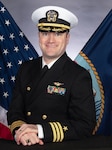 Commander Ian E. Gill