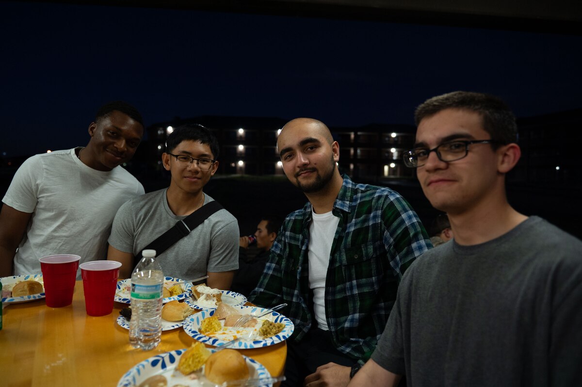 Students assigned to the 17th Training Wing enjoy a meal together at the Crossroads Student Ministry Center during Student Thanksgiving at Goodfellow Air Force Base, Texas, Nov. 22, 2024. Every year, the 17th TRW takes a step back from its vigorous training to prioritize the health and wellness of its most valued assets; its students. (U.S. Air Force photo by Airman 1st Class Brian Lummus)