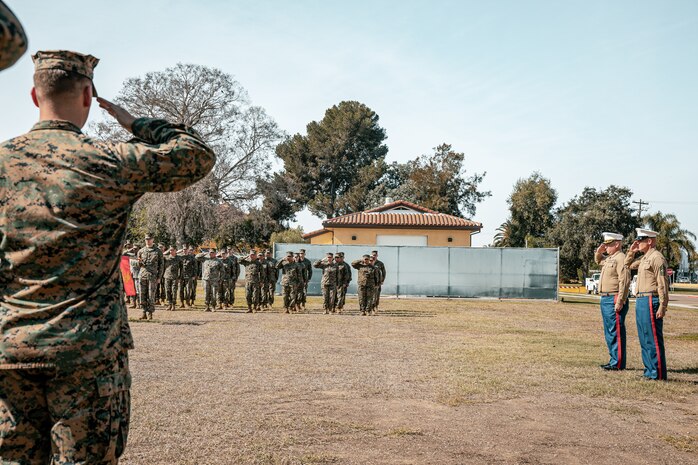 The Commanding Officer of Headquarters and Service Battalion, Marine Corps Recruit Depot San Diego, U.S. Marine Corps Col. Jason Freeby, far right, and the Sergeant Major of Headquarters and Service Battalion, Sgt. Maj. Thomas A. Bachman, front right, salute during a cake cutting ceremony at MCRD San Diego California, Nov. 6, 2024. The annual cake cutting ceremony is a long-standing tradition that celebrates the establishment of the United States Marine Corps. The Marine Corps birthday, on Nov. 10, 1775, is celebrated every year to commemorate the birth of the Corps and honor the service of all Marines, past and present. (U.S. Marine Corps photo by Cpl. Sarah M. Grawcock)