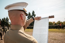 U.S. Marine Corps Maj. Joshua Kallerud, the operations officer with Headquarters and Service Battalion, reads Lt. Gen. John A Lejeune’s birthday message during a cake cutting ceremony at Marine Corps Recruit Depot San Diego, California, Nov. 6, 2024. The annual cake cutting ceremony is a long-standing tradition that celebrates the establishment of the United States Marine Corps. The Marine Corps birthday, on Nov. 10, 1775, is celebrated every year to commemorate the birth of the Corps and honor the service of all Marines, past and present. (U.S. Marine Corps photo by Cpl. Sarah M. Grawcock)