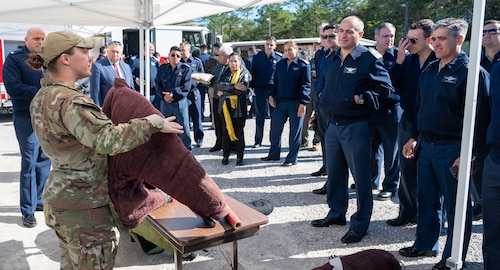 U.S. Air Force Staff Sgt. McKenzie Langan, 96th Security Forces Squadron military working dog trainer, explains the purpose of a bite suit
