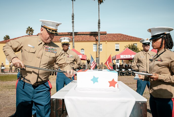The Commanding Officer of Headquarters and Service Battalion, Marine Corps Recruit Depot San Diego, U.S. Marine Corps Col. Jason Freeby, participates in a cake cutting ceremony at MCRD San Diego California, Nov. 6, 2024. The annual cake cutting ceremony is a long-standing tradition that celebrates the establishment of the United States Marine Corps. The Marine Corps birthday, on Nov. 10, 1775, is celebrated every year to commemorate the birth of the Corps and honor the service of all Marines, past and present. (U.S. Marine Corps photo by Cpl. Sarah M. Grawcock)