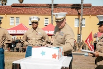 The Commanding Officer of Headquarters and Service Battalion, Marine Corps Recruit Depot San Diego, U.S. Marine Corps Col. Jason Freeby, participates in a cake cutting ceremony at MCRD San Diego California, Nov. 6, 2024. The annual cake cutting ceremony is a long-standing tradition that celebrates the establishment of the United States Marine Corps. The Marine Corps birthday, on Nov. 10, 1775, is celebrated every year to commemorate the birth of the Corps and honor the service of all Marines, past and present. (U.S. Marine Corps photo by Cpl. Sarah M. Grawcock)