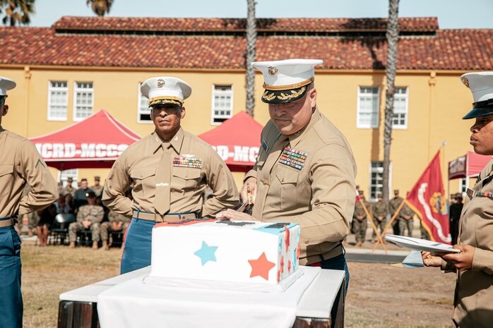 The Commanding Officer of Headquarters and Service Battalion, Marine Corps Recruit Depot San Diego, U.S. Marine Corps Col. Jason Freeby, participates in a cake cutting ceremony at MCRD San Diego California, Nov. 6, 2024. The annual cake cutting ceremony is a long-standing tradition that celebrates the establishment of the United States Marine Corps. The Marine Corps birthday, on Nov. 10, 1775, is celebrated every year to commemorate the birth of the Corps and honor the service of all Marines, past and present. (U.S. Marine Corps photo by Cpl. Sarah M. Grawcock)
