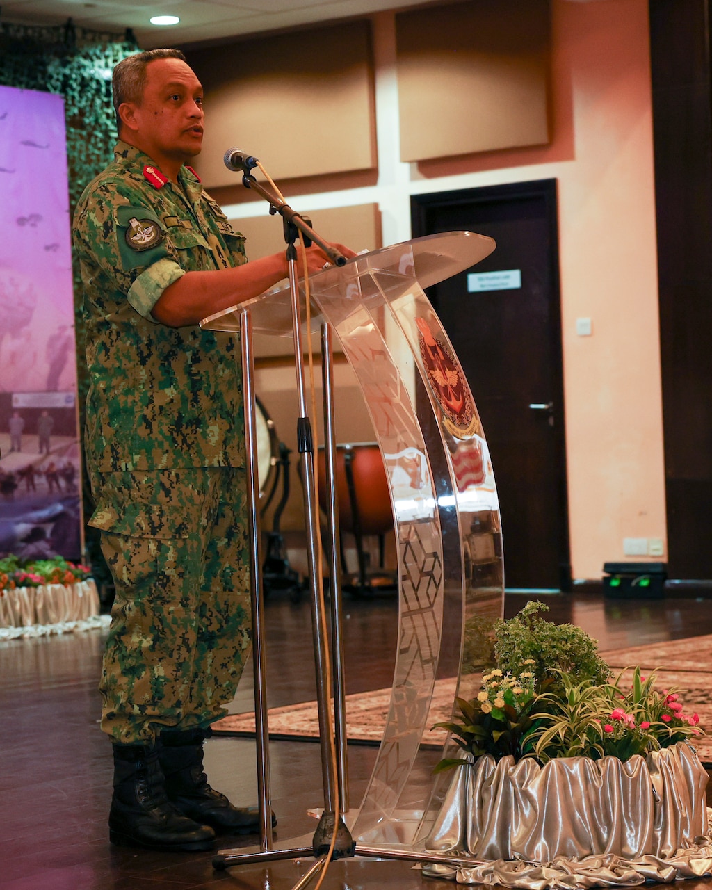 BANDAR SERI BEGAWAN, Brunei (Nov. 25, 2024) – Royal Brunei Armed Forces Col. Aldi bin Haji Hassan, deputy joint force commander, RBAF, gives remarks during the closing ceremony of Cooperation Afloat Readiness and Training (CARAT) Brunei 2024 at Wira Seni Hall, RBAF Band, Bolkiah Garrison, Brunei, Nov. 25. This year marks the 30th iteration of CARAT, a multinational exercise series designed to enhance U.S. and partner navies’ abilities to operate together in response to traditional and non-traditional maritime security challenges in the Indo-Pacific region. (U.S. Navy Photo by Mass Communication Specialist 2nd Class Zachary Grooman)