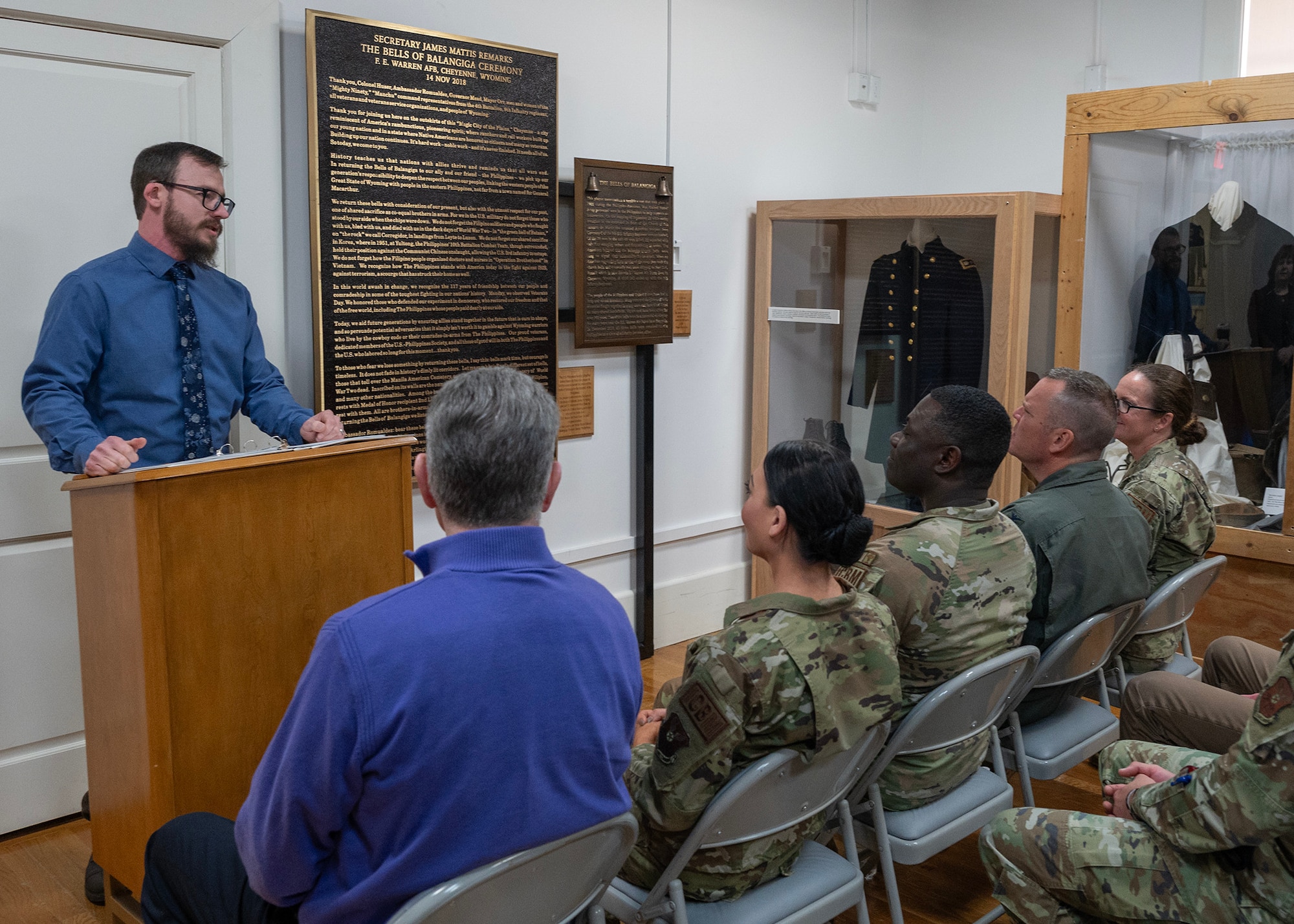 civilian historian addresses audience