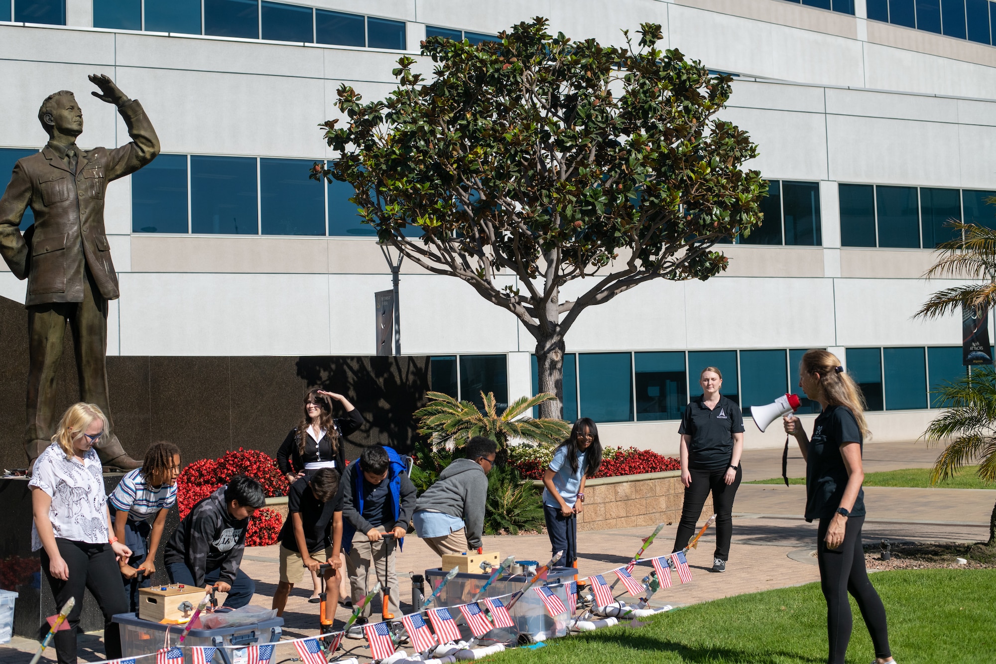 Ramona Elementary students prepare to sendoff their paper rockets during the United States Space Force and Space Systems Command Anniversary STEM event on Nov. 12, 2024, at Los Angeles Air Force Base, Calif. Activities like the rocket launch help teach students about the science and engineering behind a launch.