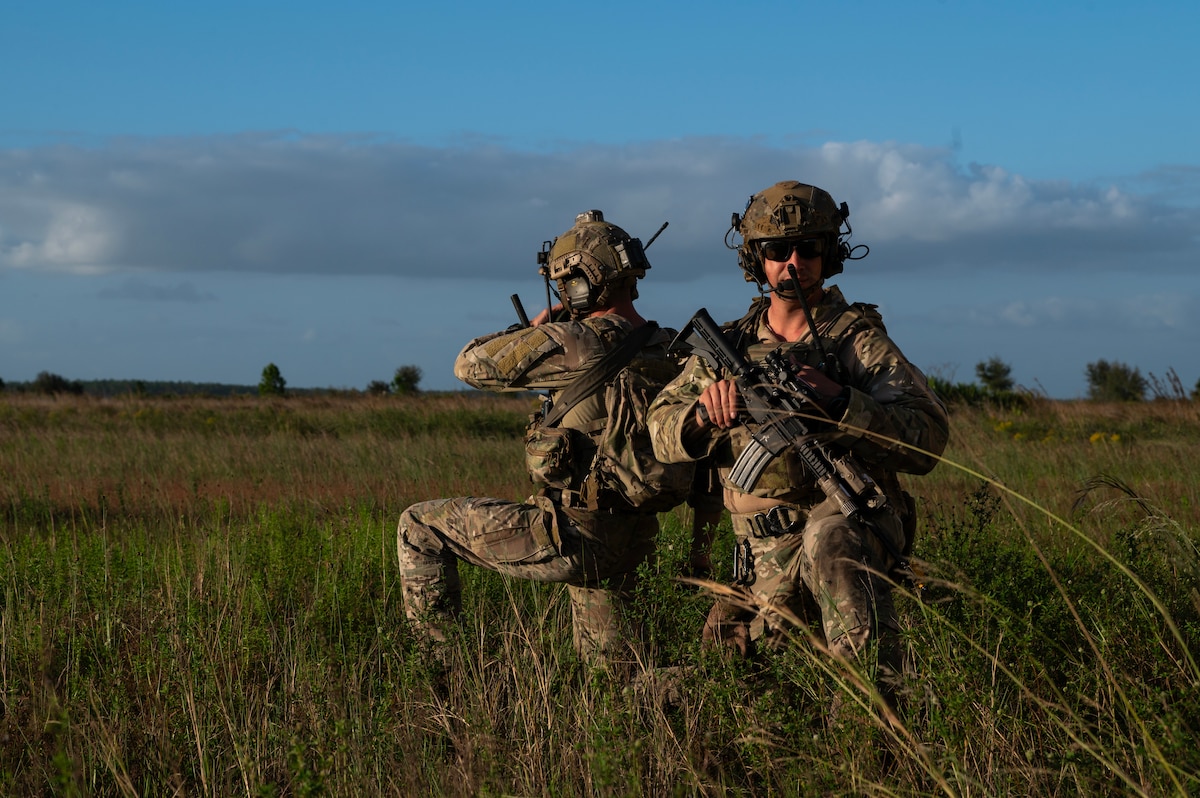 Airmen kneel