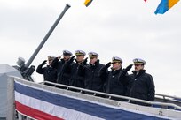 Sailors of the USS Beloit (LCS 29) man the ship and bring it to life during its commissioning ceremony in Milwaukee.