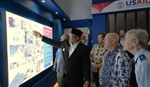 U.S. Air Force Brig Gen Carla Riner, Air National Guard advisor to the Pacific Air Forces Director of Air and Cyberspace Operations, tours the new exhibit honoring U.S. support in disaster relief with the Acting Governor of Aceh Province and the USAID-Jakarta Mission Director at the Aceh Tsunami Museum opening ceremony in Banda Aceh, Indonesia, Nov. 10, 2024.  The Indonesian Government requested international disaster relief within 24 hours of the tsunami hitting Banda Aceh. U.S. Indo-Pacific Command responded immediately by initiating Operation Unified Assistance. The operation last over 3 months and saved thousands of lives. The U.S.-Indonesian comprehensive strategic partnership continues to grow today. With over 220 collaborative events annually, the U.S. remains committed to supporting Indonesia and all partnered countries, in military and humanitarian efforts with the goal of ensuring a free and open Indo-Pacific. (USAID courtesy photo)