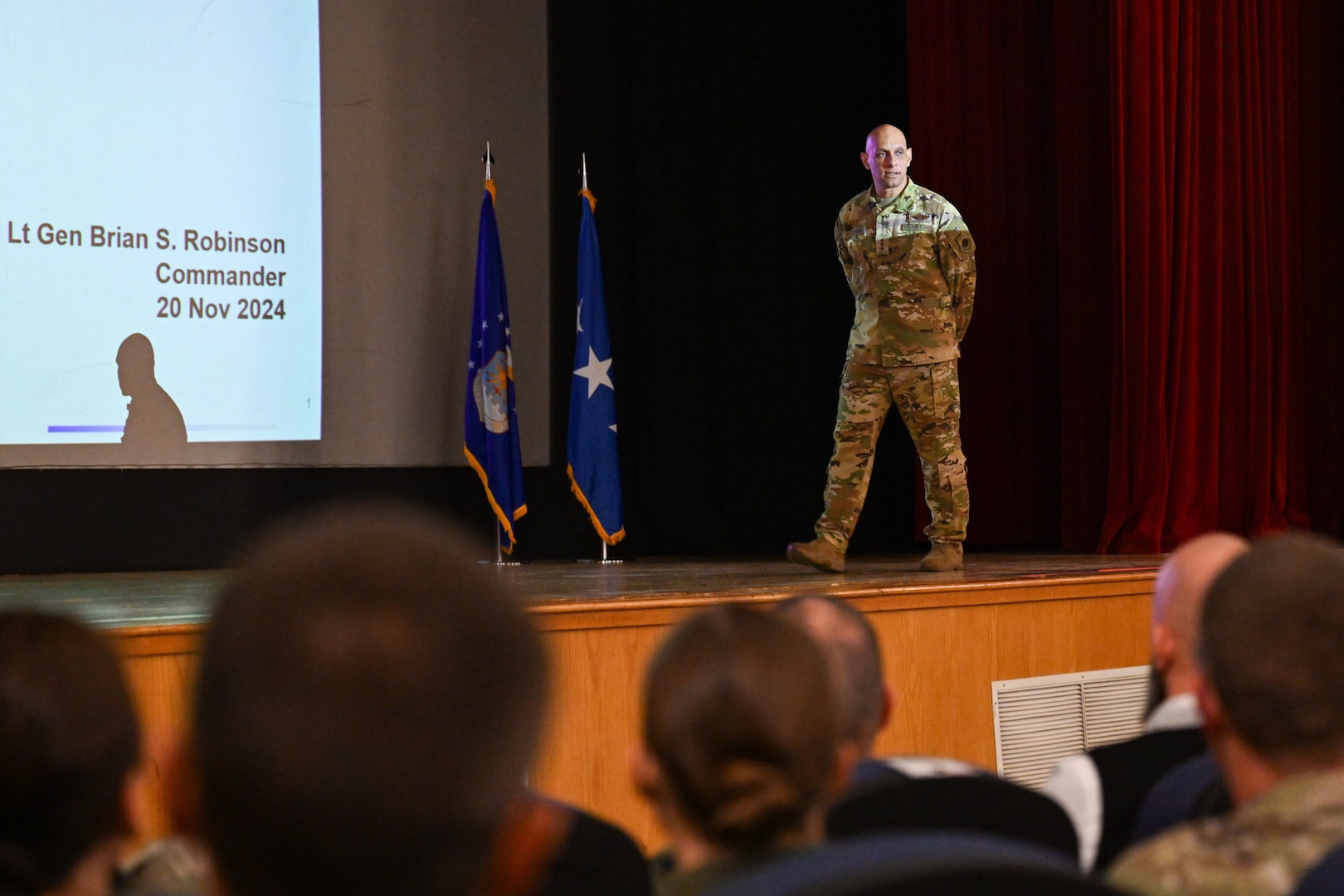 U.S. Air Force Lt. Gen. Brian S. Robinson, commander of the Air Education and Training Command (AETC), holds an all-call at Altus Air Force Base, Oklahoma, Nov. 20, 2024. Robinson shared upcoming changes as AETC transitions to the Airman Development Command in 2025. (U.S. Air Force photo by Airman 1st Class Jonah Bliss)