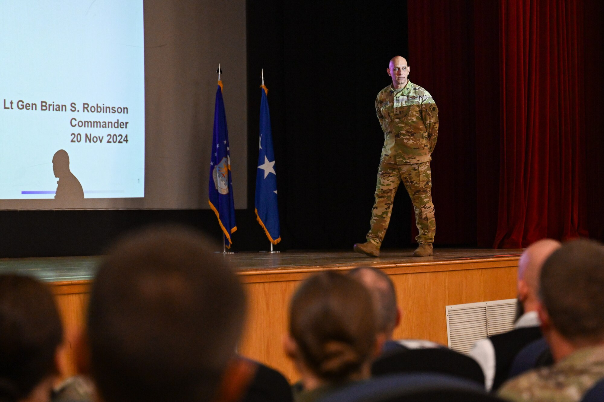 U.S. Air Force Lt. Gen. Brian S. Robinson, commander of the Air Education and Training Command (AETC), holds an all-call at Altus Air Force Base, Oklahoma, Nov. 20, 2024. Robinson shared upcoming changes as AETC transitions to the Airman Development Command in 2025. (U.S. Air Force photo by Airman 1st Class Jonah Bliss)