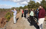 Jake McCumber, program manager, Massachusetts Army National Guard Natural Resources & Training Lands Program, highlights conservation achievements at Camp Edwards Training Site Nov. 22, 2024. The U.S. Fish and Wildlife Service presented his team with the 2024 Northeast Region Military Conservation Partner Award.