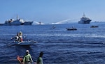 China Coast Guard vessels shoot water cannons at fishermen on 10 December 2023 in Bajo de Masinloc (also known as Scarborough Shoal), disputed territory claimed by the Philippines and China.