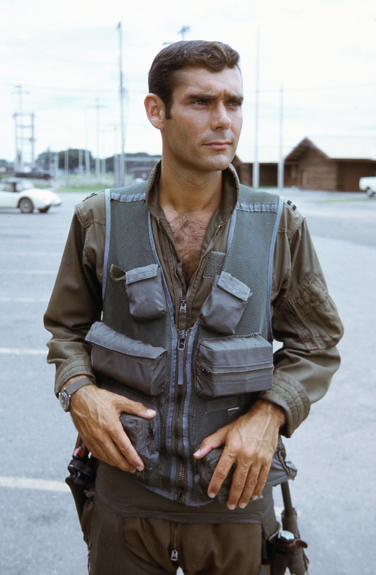 U.S. Air Force Capt. Bruce Cox wears a survival vest at Takhli Royal Thai Air Force Base, Thailand, 1973. Cox served 21 years active duty before dedicating another 26 years as an Air Force contractor supporting F-16 and F-35 training.