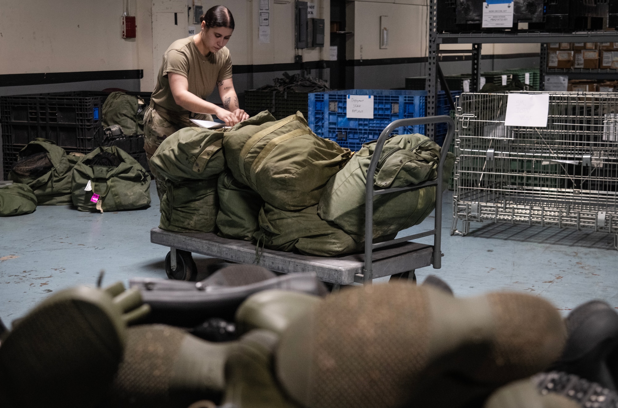 Airman 1st Class Autumn Dunavan, 4th Logistics Readiness Squadron Individual Protective Equipment (IPE) Journeyman, inspects and inventories personal protective equipment.