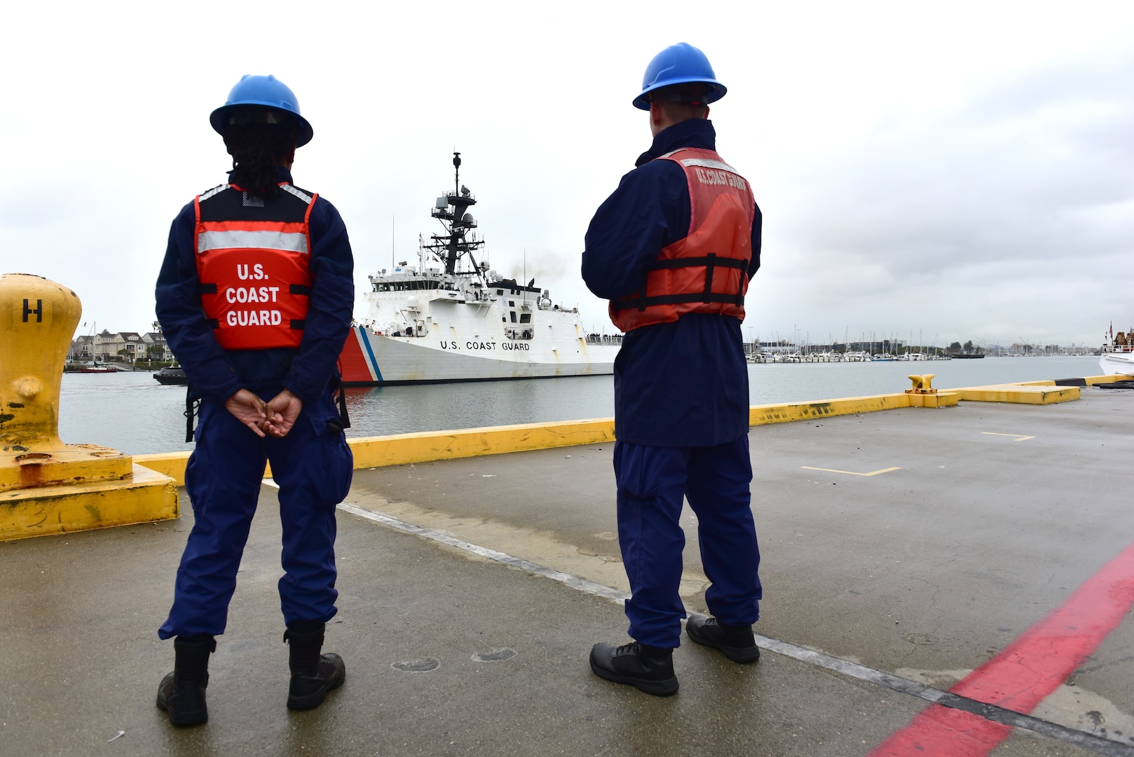 U.S. Coast Guardsmen assist in mooring evolution as the U.S. Coast Guard Cutter Munro (WSML 755) returns home to Alameda, California, Nov. 25, 2024. Munro’s crew deployed for two-months on a counter-drug patrol in international waters off the coasts of Central and South America in the Eastern Pacific Ocean. (U.S. Coast Guard photo by Petty Officer 3rd Class Danish Khan)