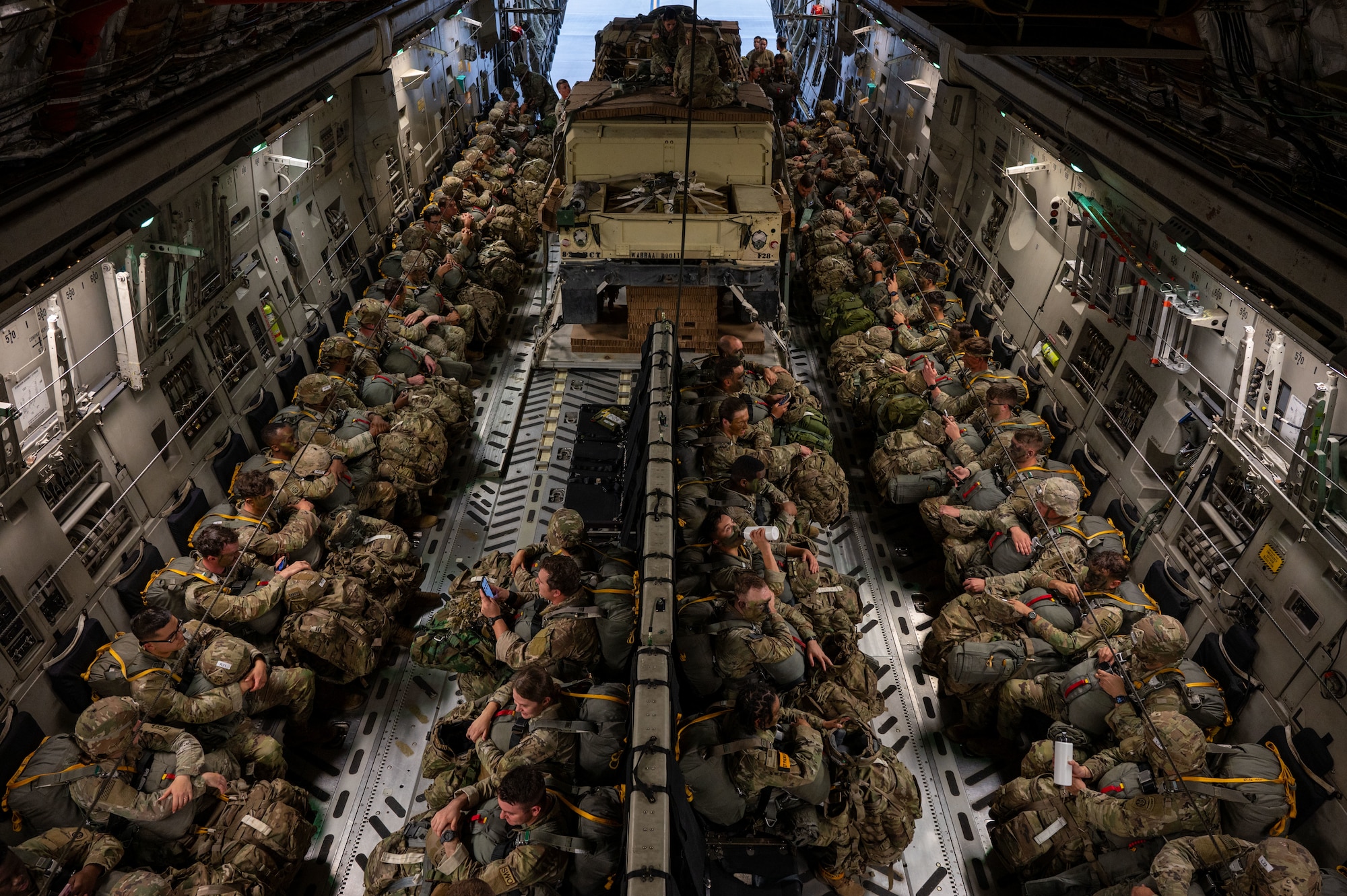 U.S. Soldiers sit in aircraft