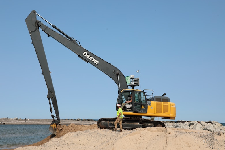 Land-based image of dredging operations at Little Lake Harbor, Michigan.