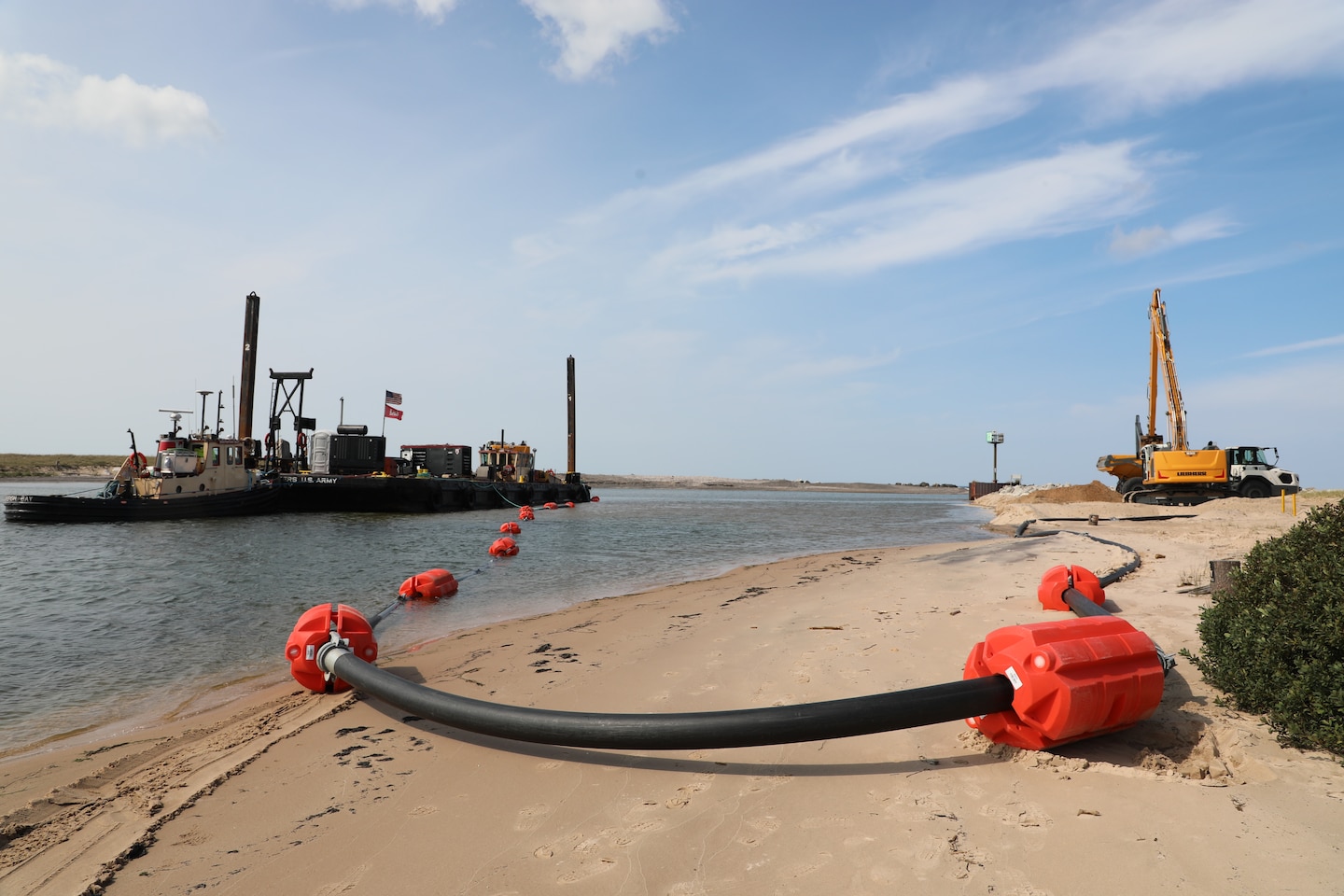 Land-based image of dredging operations at Little Lake Harbor, Michigan.