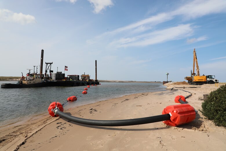 Land-based image of dredging operations at Little Lake Harbor, Michigan.