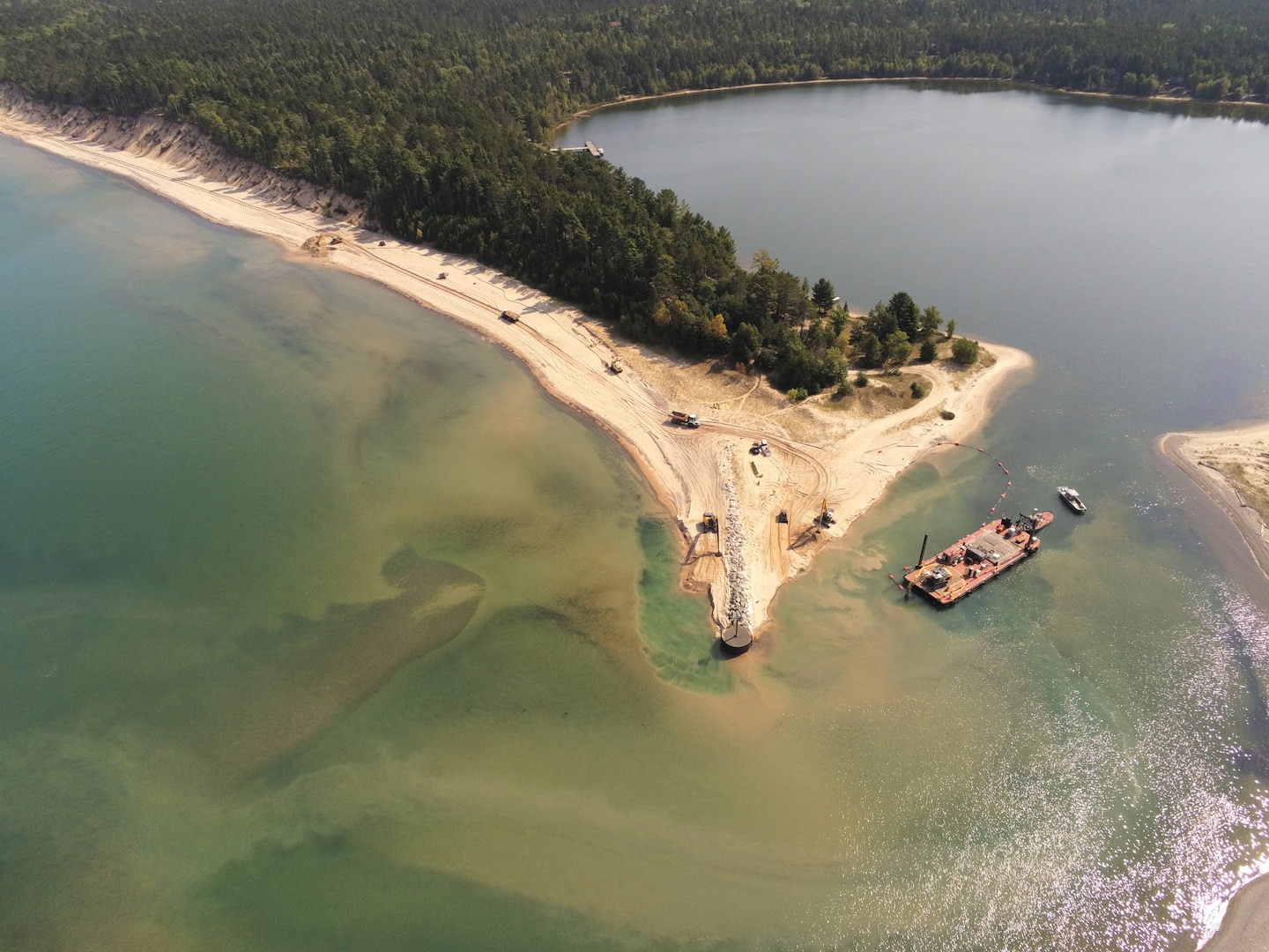 Aerial image of dredging operations at Little Lake Harbor, Michigan.