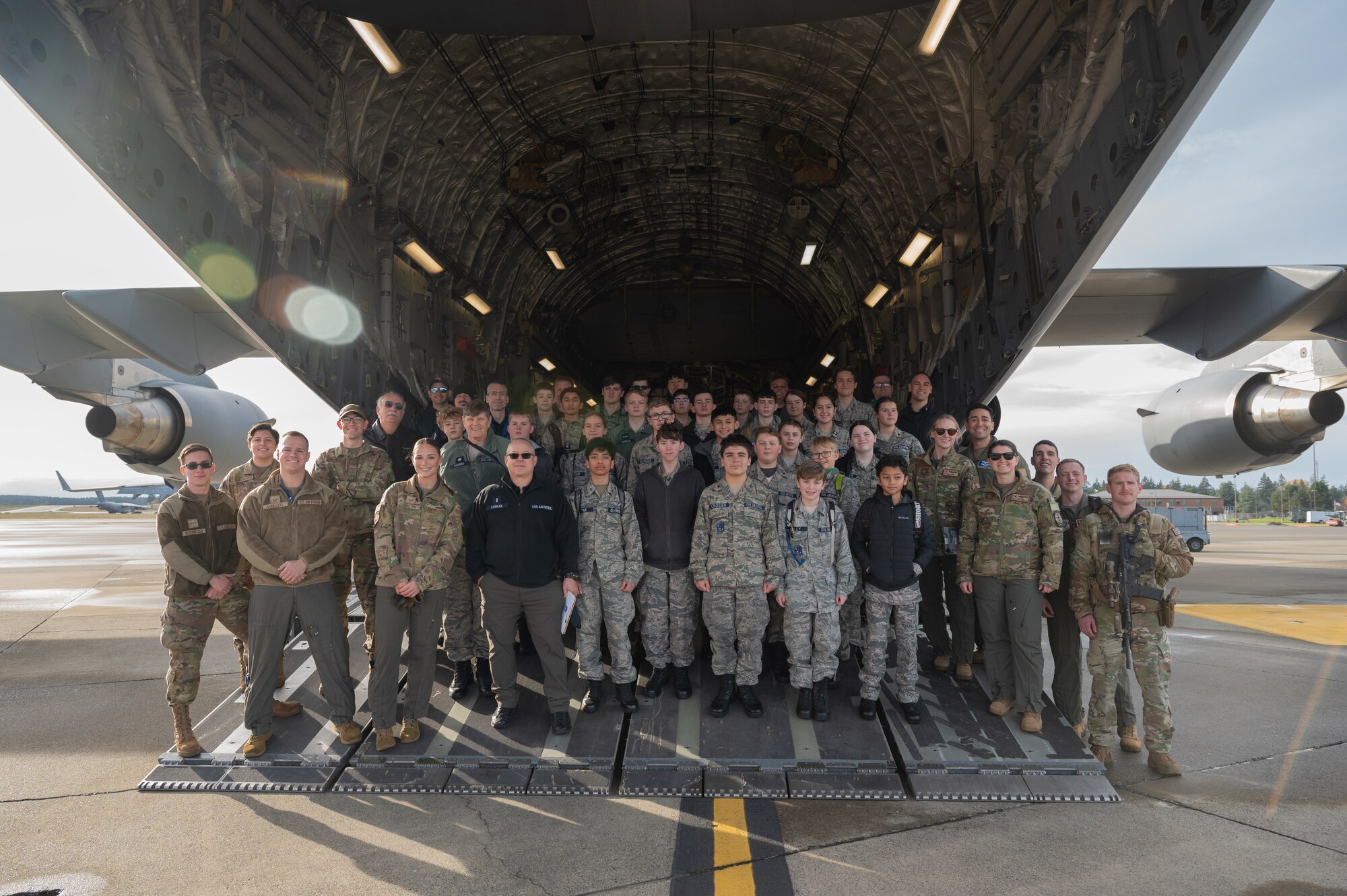 The 62d Airlift Wing hosted a tour for Washington Civil Air Patrol cadets at Joint Base Lewis-McChord, Washington, Nov. 23, 2024. CAP is the civilian auxiliary of the United States Air Force and a congressionally chartered nonprofit organization that operates under three missions: Aerospace Education, Emergency Services, and Cadet Programs. As an Aviation Inspiration and Mentorship Wing, the 62d AW seeks to foster community partnerships and educate and develop future and ready Airmen.