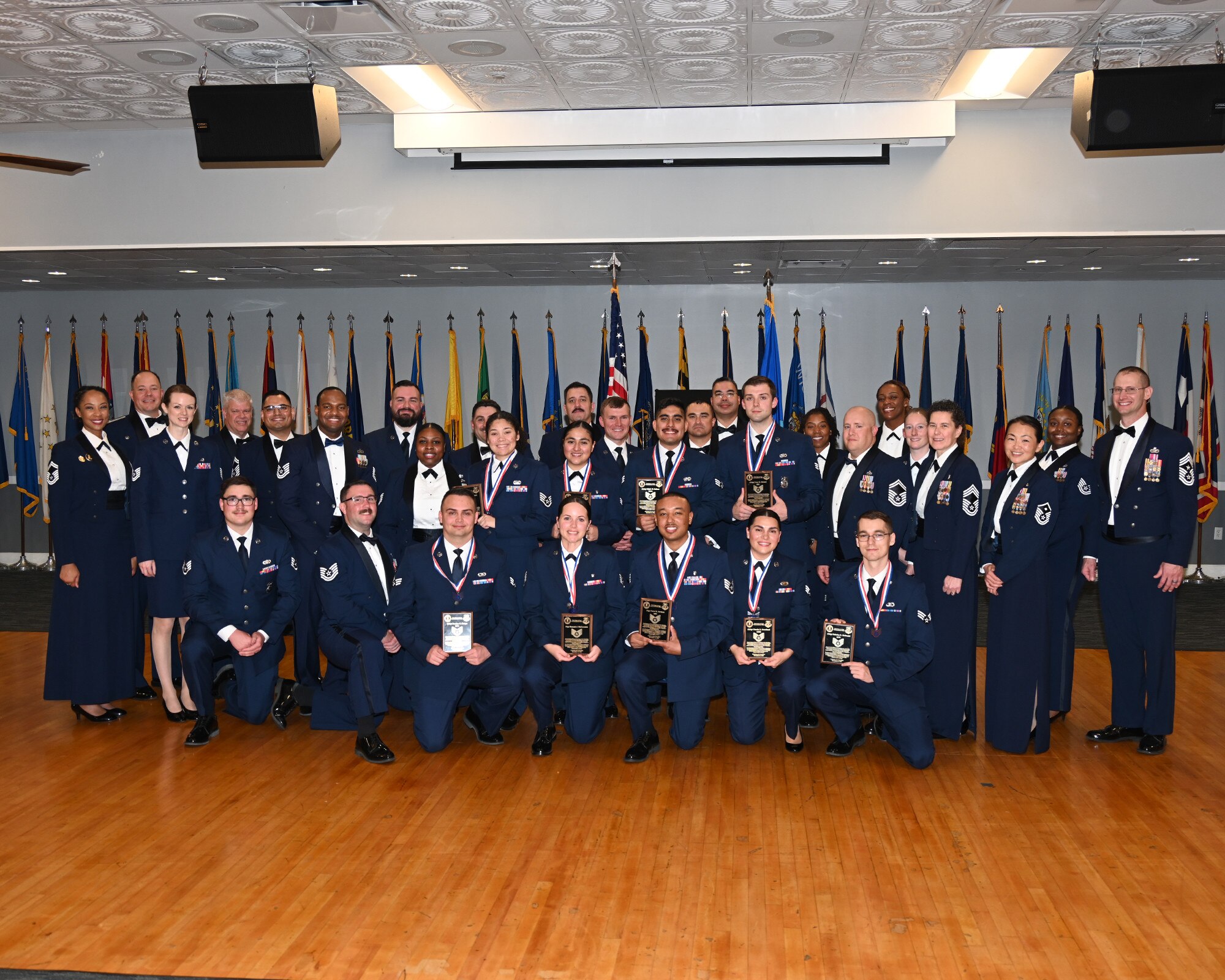 The NCO induction ceremony welcomes newly promoted Airmen to the NCO tier.
