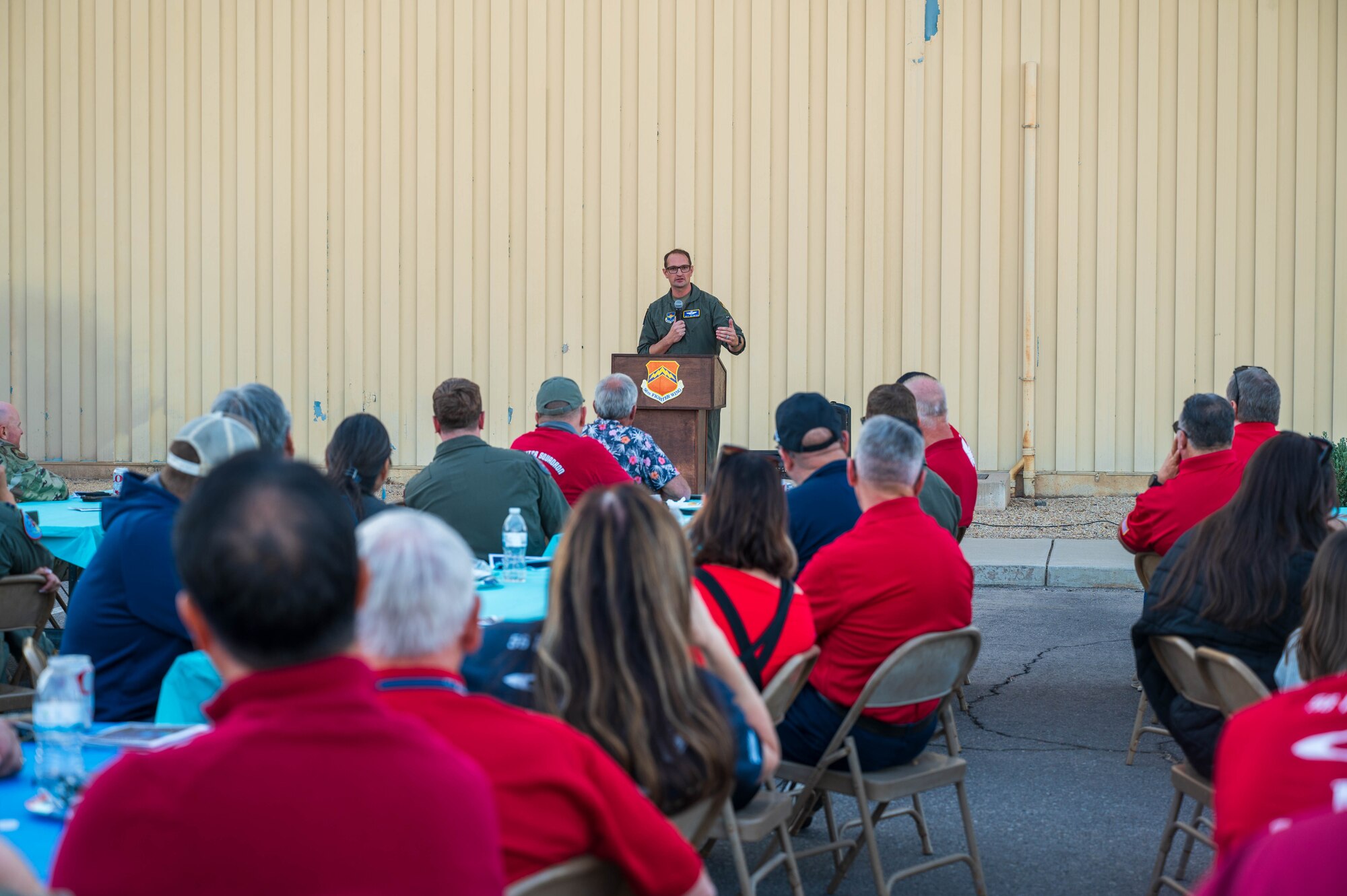 U.S. Air Force Col. Matthew Johnston, 56th Fighter Wing deputy commander, gives closing remarks during a farewell ceremony for the last F-16 Fighting Falcon simulators, Nov. 22, 2024, at Luke Air Force Base, Arizona.