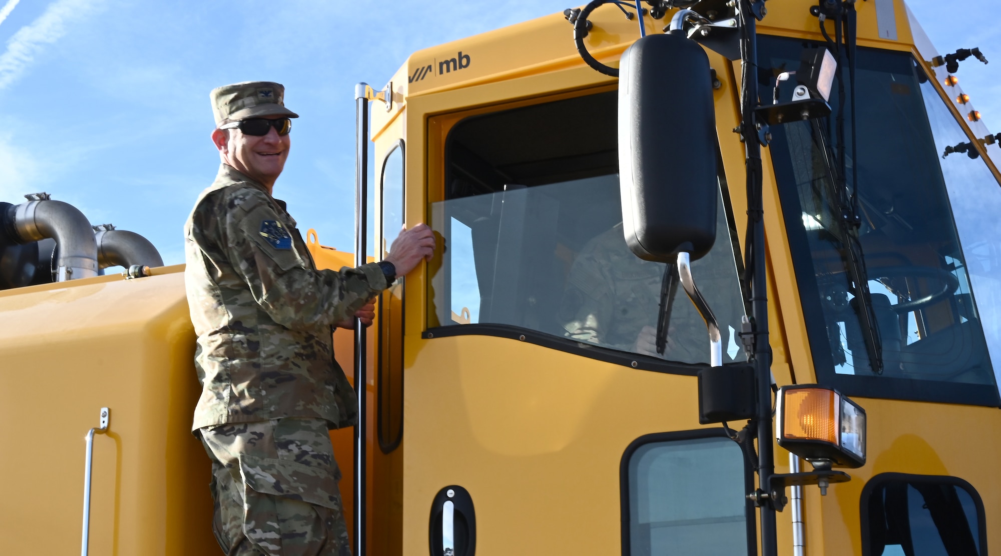 U.S. Space Force Col. Kenneth Klock, Space Base Delta 1 commander, drives a 21st Civil Engineer Squadron snowplow as part of an immersion tour on Peterson Space Force Base, Colorado, Nov. 21, 2024. The 21st CES provides essential infrastructure support to 111 mission partners and Peterson SFB, enabling the operation of critical USSF weapon systems. (U.S. Space Force photo by Christopher L. Ingersoll)