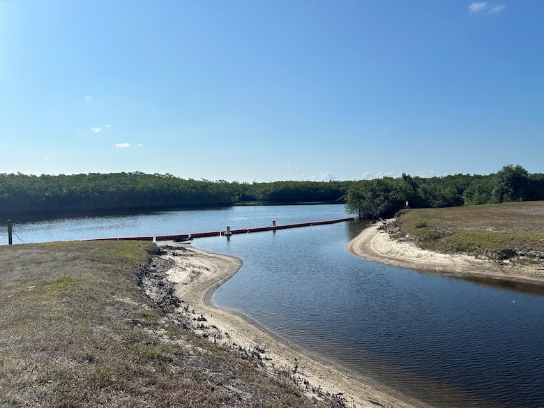 Downstream opening to Faka Union Canal that allows manatees to enter the Manatee Mitigation Feature under the boat barrier.