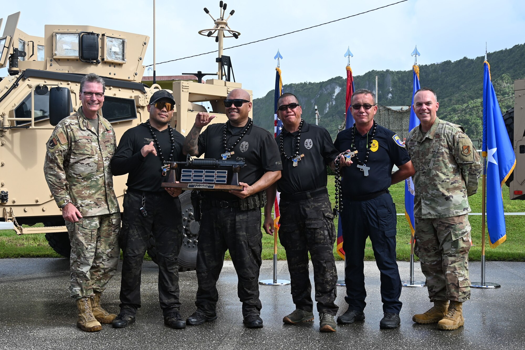 The Guam Police Department team poses as the champions of the 2024 Battle of the Branches on Andersen Air Force Base, Guam, Nov. 22, 2024. The team received the highest overall score for time and accuracy against six other participating teams. (U.S. Air Force photo by Airman 1st Class Natasha Ninete)