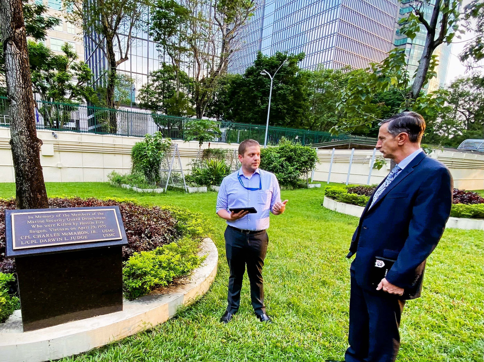 A U.S. consulate general staff member gives Pacific Air Forces Commander, Gen. Kevin Schneider, a tour of the former U.S. Embassy grounds in Ho Chi Minh City, Vietnam, Nov. 18, 2024. This marks the site of the last two U.S. service members’ deaths in Vietnam April 29, 1975. (U.S. Air Force photo by Staff Sergeant Elizabeth Taranto)