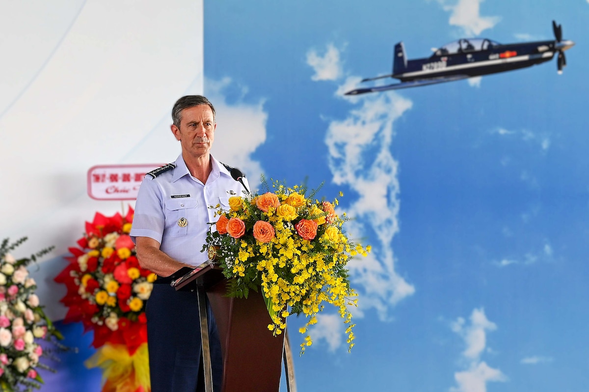 Pacific Air Forces Commander, Gen. Kevin Schneider, provides remarks at the Vietnamese Air Defence Air Force’s official acquisition ceremony for the T6-C training aircraft on Phan Thiet Air Base, Vietnam, Nov. 20, 2024. Schneider spoke to an audience of Vietnamese and U.S. military and official delegates. (U.S. Air Force photo by Staff Sergeant Elizabeth Taranto)