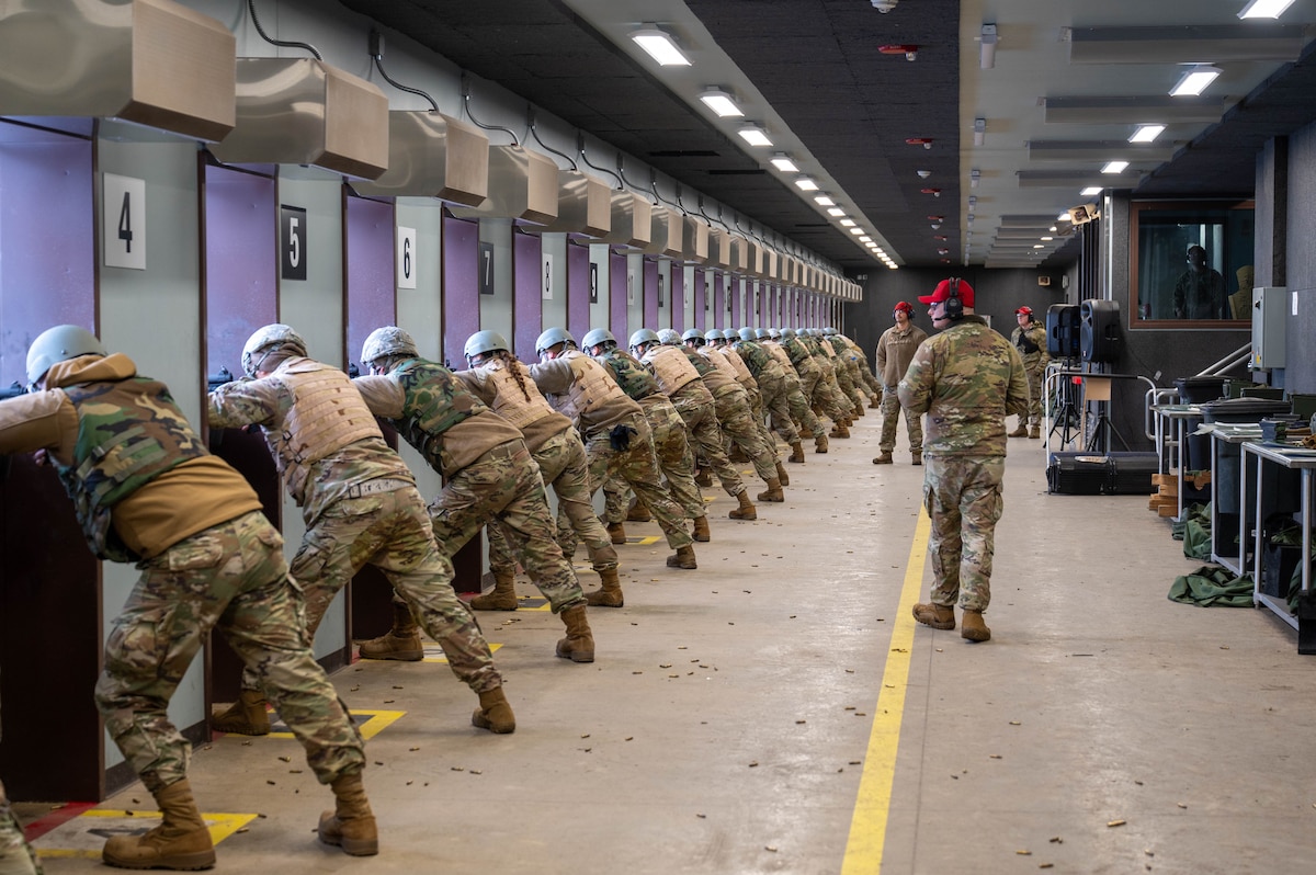 U.S. Air Force Airmen fire M4 carbines in unison during a Combat Arms Training and Maintenance course at Eielson Air Force Base, Alaska, Oct. 23, 2024.