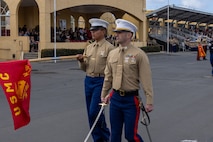 U.S. Marine Corps Capt. Michael Held, right, follow series commander with Mike Company, 3rd Recruit Training Battalion, participates in a graduation ceremony at Marine Corps Recruit Depot San Diego, California, Nov. 15, 2024. Graduation took place at the completion of the 13-week transformation, which included training for drill, marksmanship, basic combat skills, and Marine Corps customs and traditions. (U.S. Marine Corps photo by Lance Cpl. Jacob B. Hutchinson)